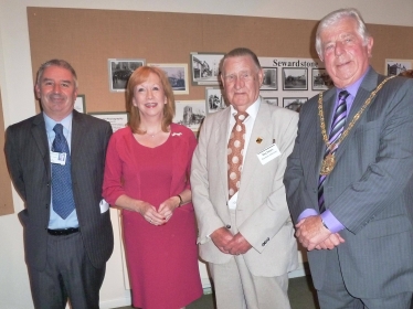 Eleanor Laing MP at Epping Forest District Museum with staff and Chairman