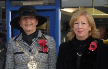 Cllr Penny Smith taking the salute as Chairman of Epping Forest District Council